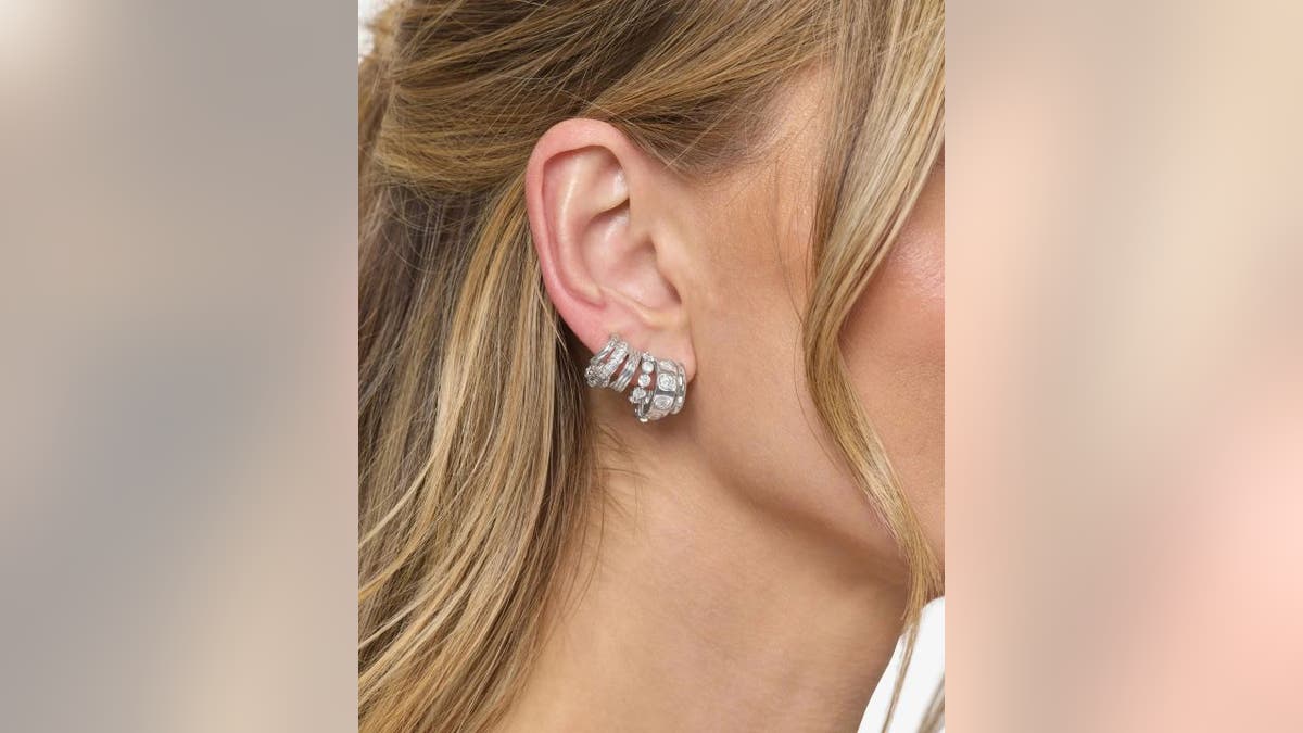This unique earring includes four pieces of jewelry. 
