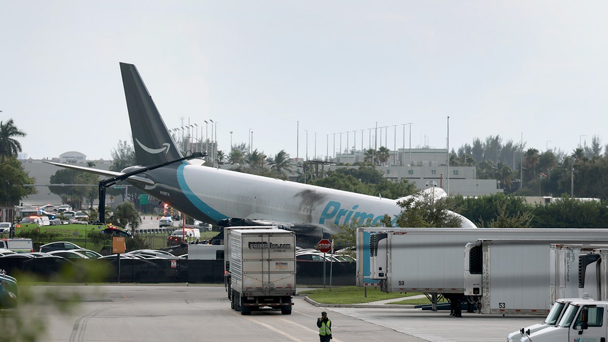 An Amazon cargo plane is seen after it crashed at Miami International Airport on September 06, 2026 in Miami, Florida. In a statement, the Federal Aviation Administration said Prime Air Flight 7598 overran the runway while landing around 2 p.m. after departing from Luis Muñoz Marín International Airport in San Juan, Puerto Rico, earlier today. (Photo by Joe Raedle/Getty Images)