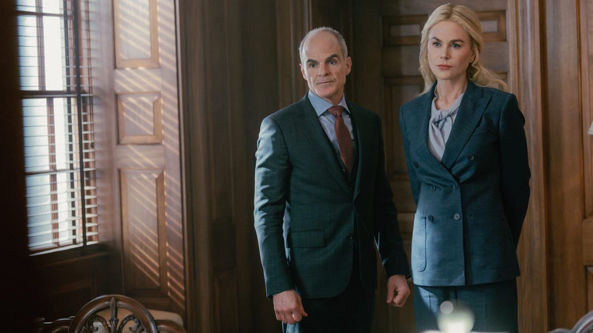 Michael Kelly and Nicole Kidman stand together in a scene from Lioness.