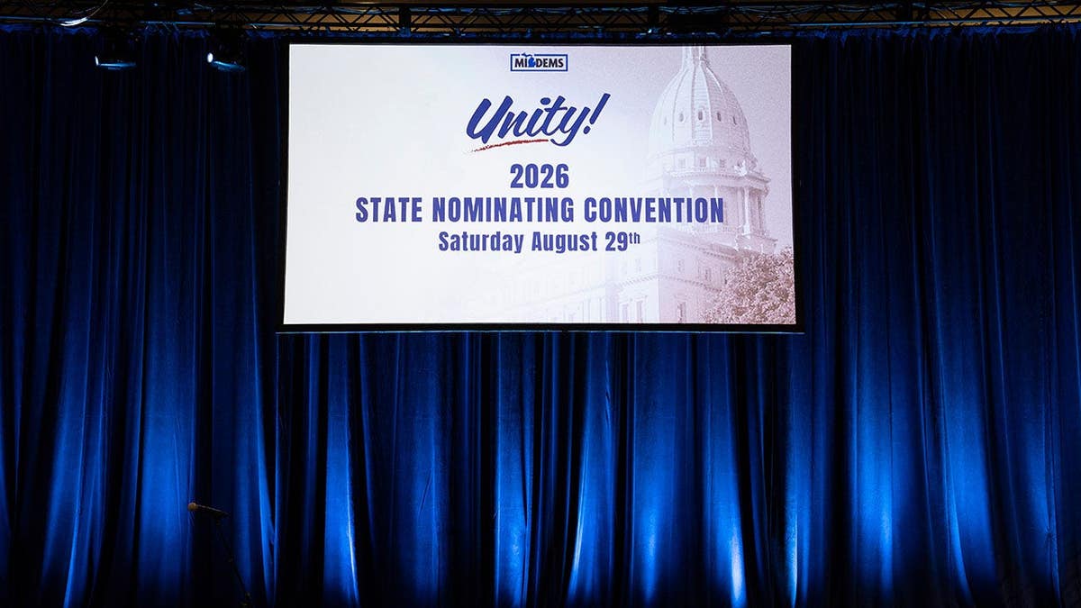 Signage displaying unity messaging at Michigan Democratic Party's 2026 nominating convention in Lansing.