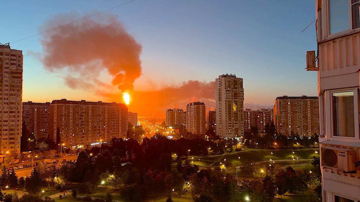 Flames and smoke rise from Moscow's oil refinery after a Ukrainian drone attack.