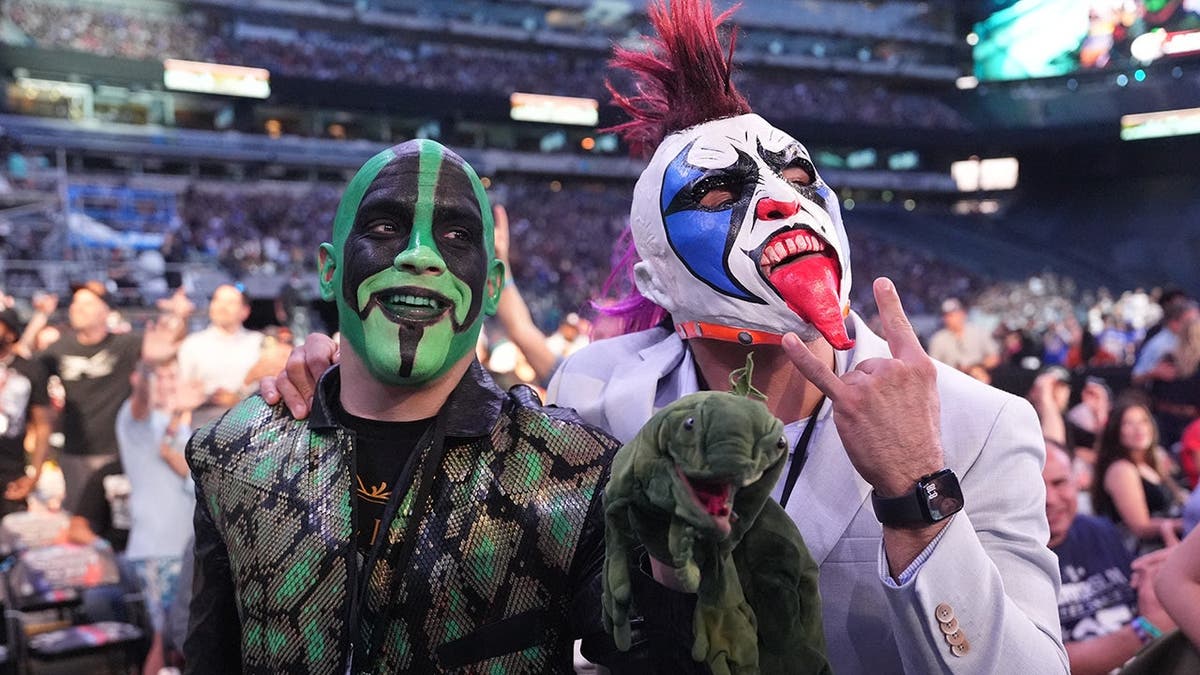 Mr. Iguana and Psycho Clown sit in the audience at MetLife Stadium. Mr. Iguana and Psycho Clown sit in the audience at MetLife Stadium.