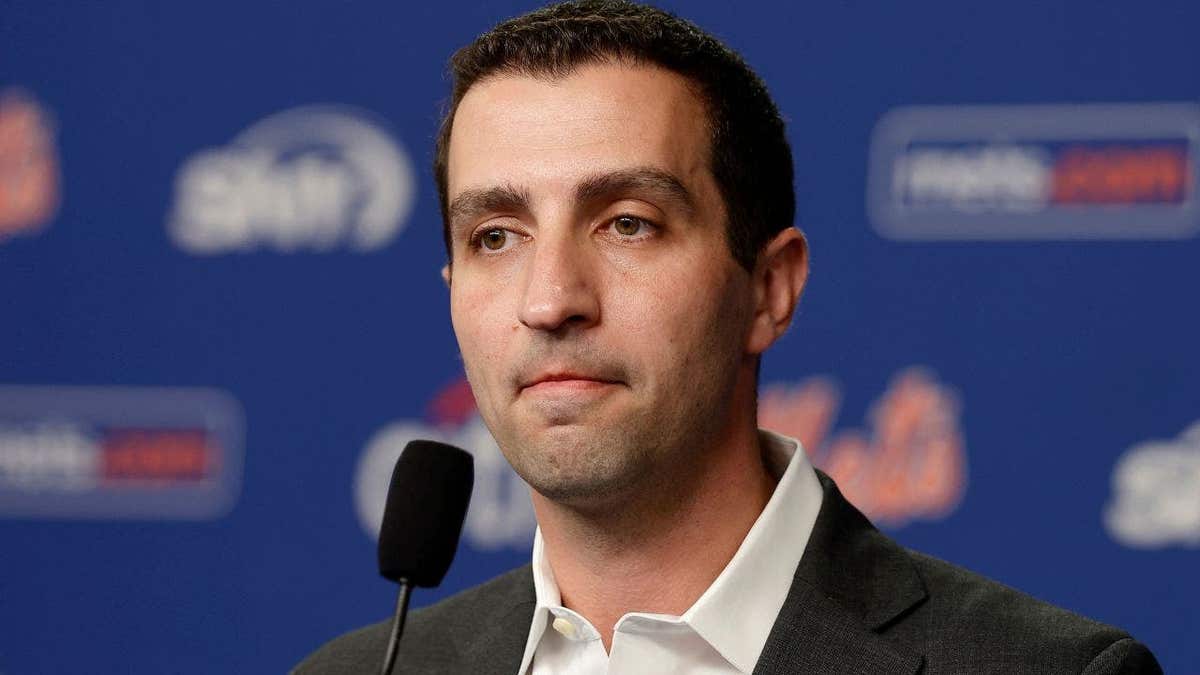 David Stearns listens to a question from the media at Citi Field.