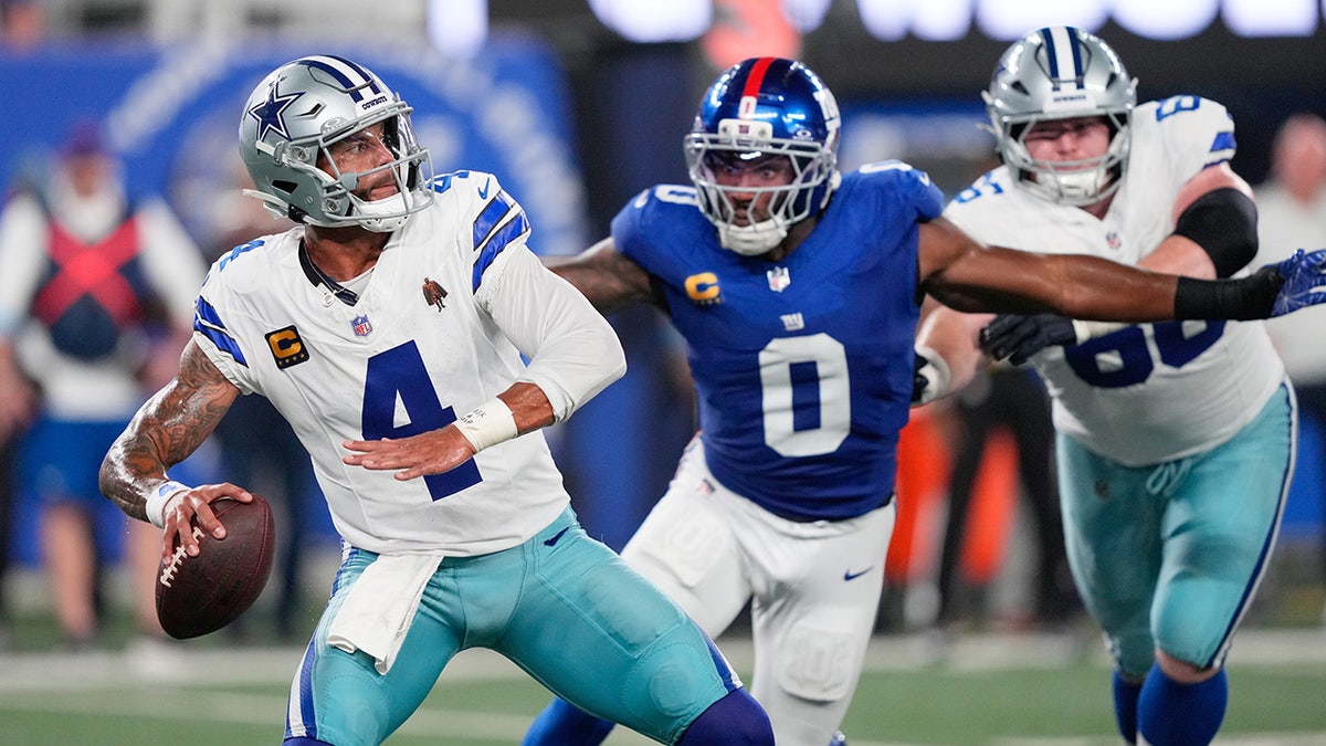 Dak Prescott launches a pass