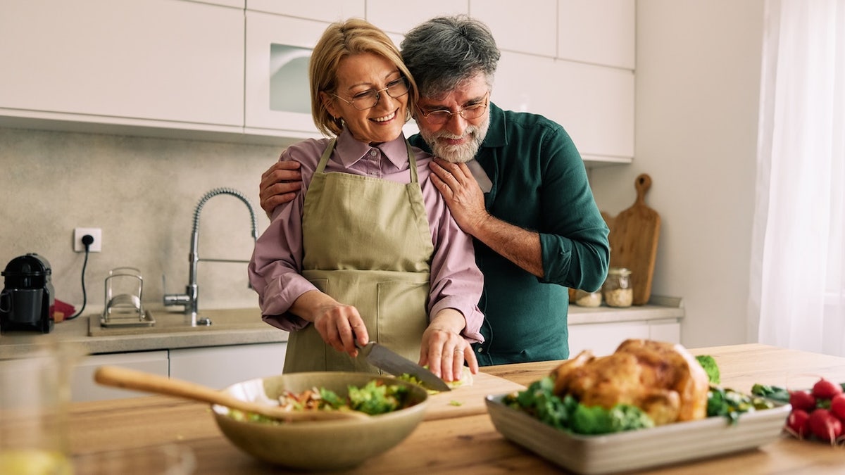 Older couple healthy cooking