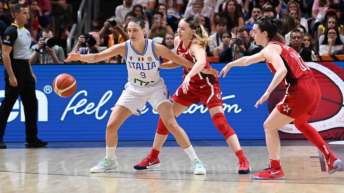 Paige Bueckers #4 defends during USA Basketball Women's National Team game against Italy in Berlin.