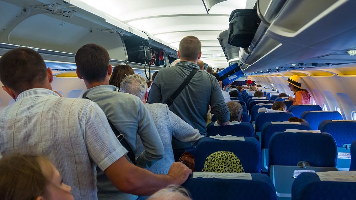 Passengers exit an aircraft after landing