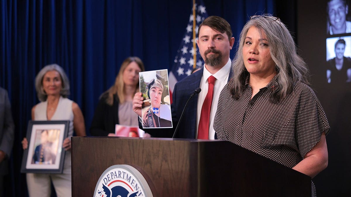 Patricia Fox speaks at a podium
