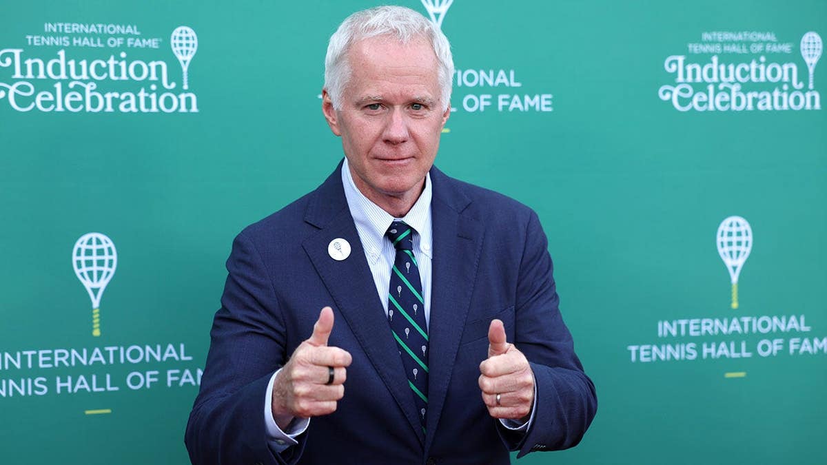 Patrick McEnroe poses for a photo at the Red Carpet Pre-Show.