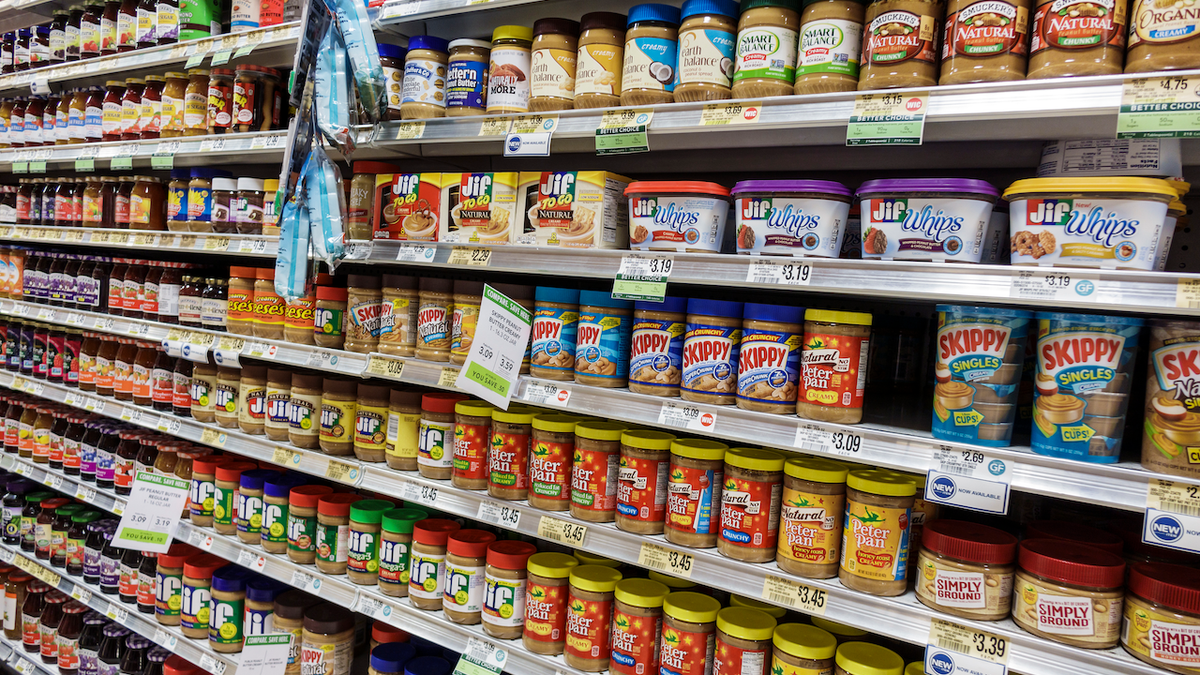 Peanut butter jars on shelves inside a Publix supermarket in Fort Lauderdale, Fla.