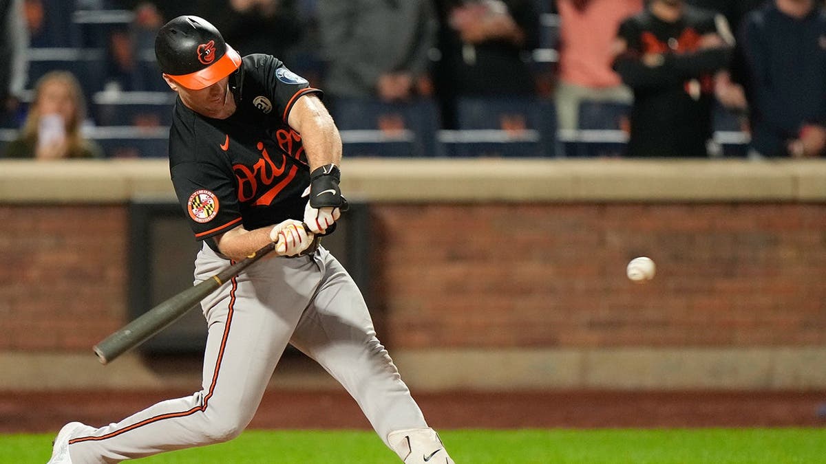 Pete Alonso hits a solo home run during a baseball game against the New York Mets in New York.
