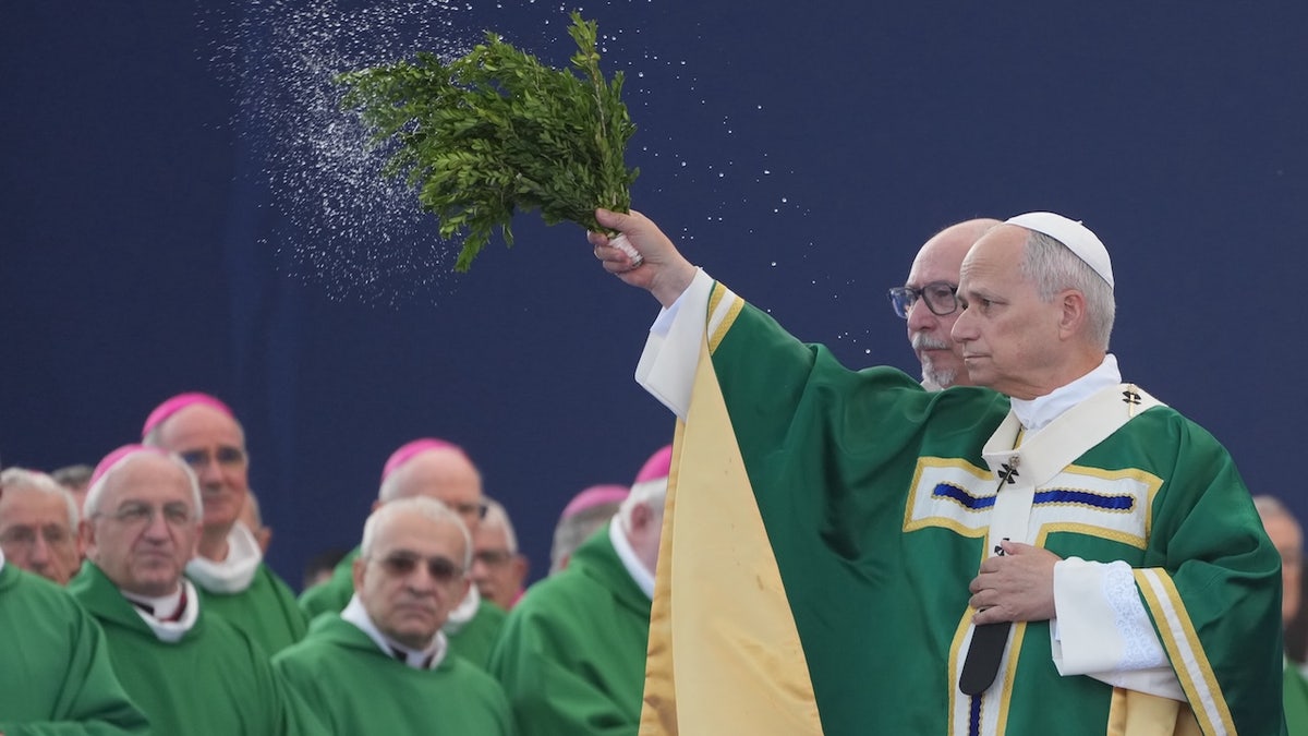 Pope Leo XIV presides over Mass at the Sanctuary of Our Lady of Lourdes, Sunday, Sept. 27, 2026, in Lourdes, France.