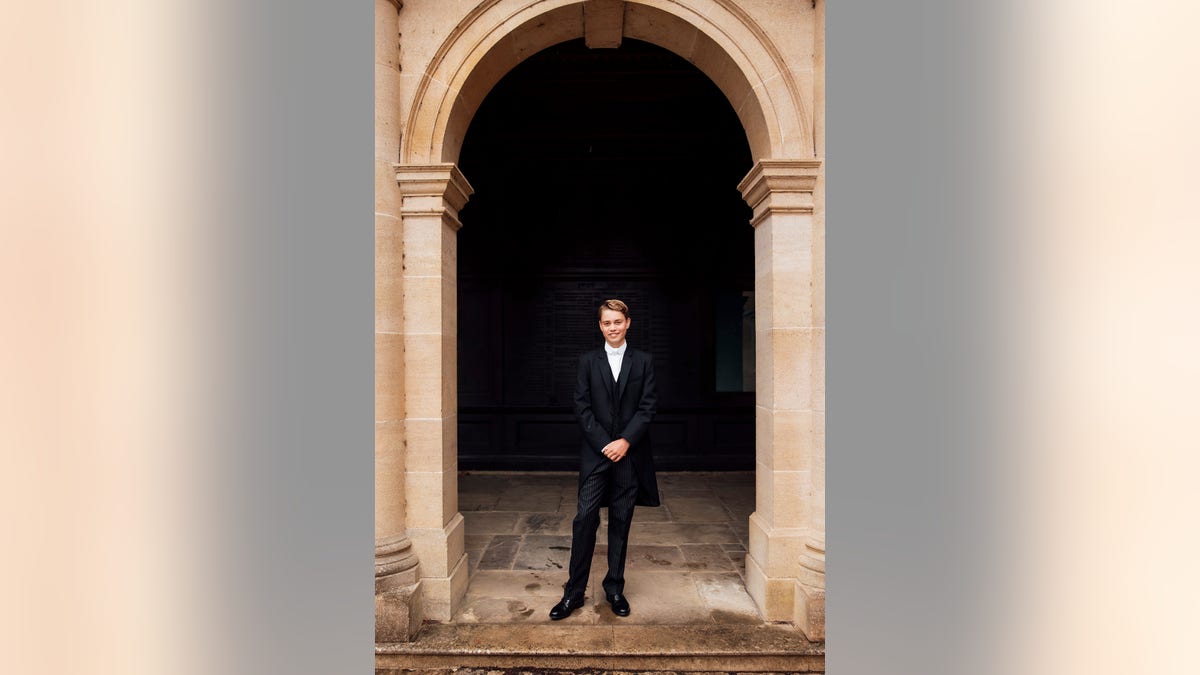 Prince George poses for a photo at Eaton