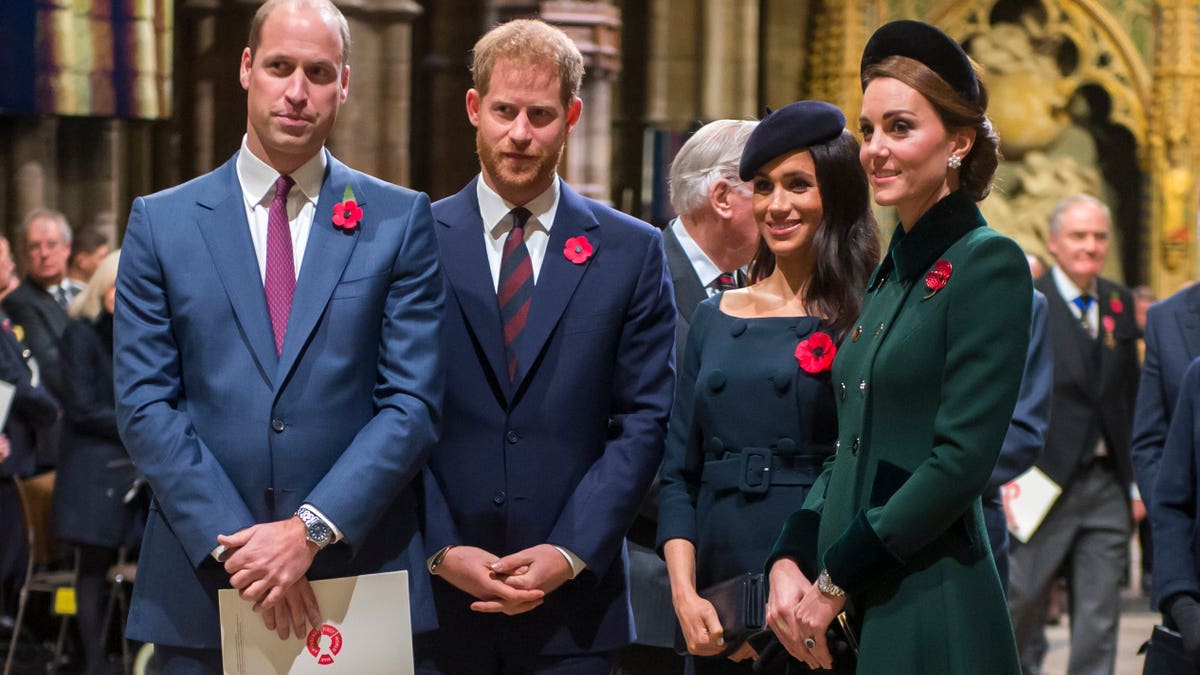 Prince William, Catherine, Prince Harry and Meghan attend a Remembrance Day service at Westminster Abbey.