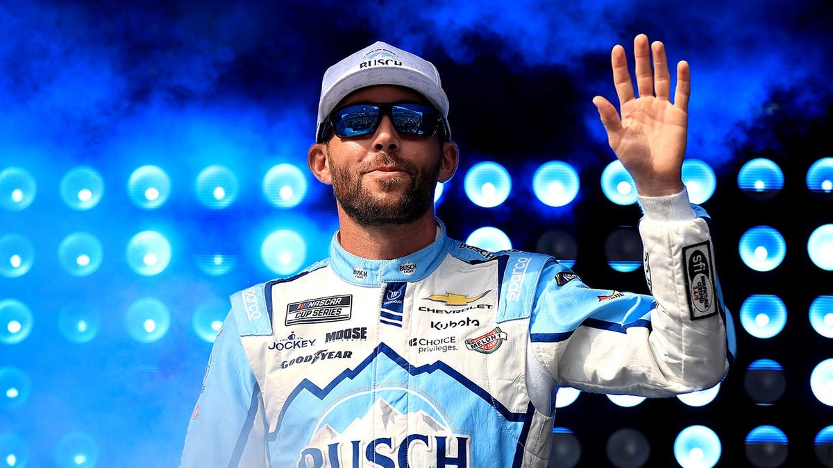 Ross Chastain waves to fans during driver introductions at Darlington Raceway.