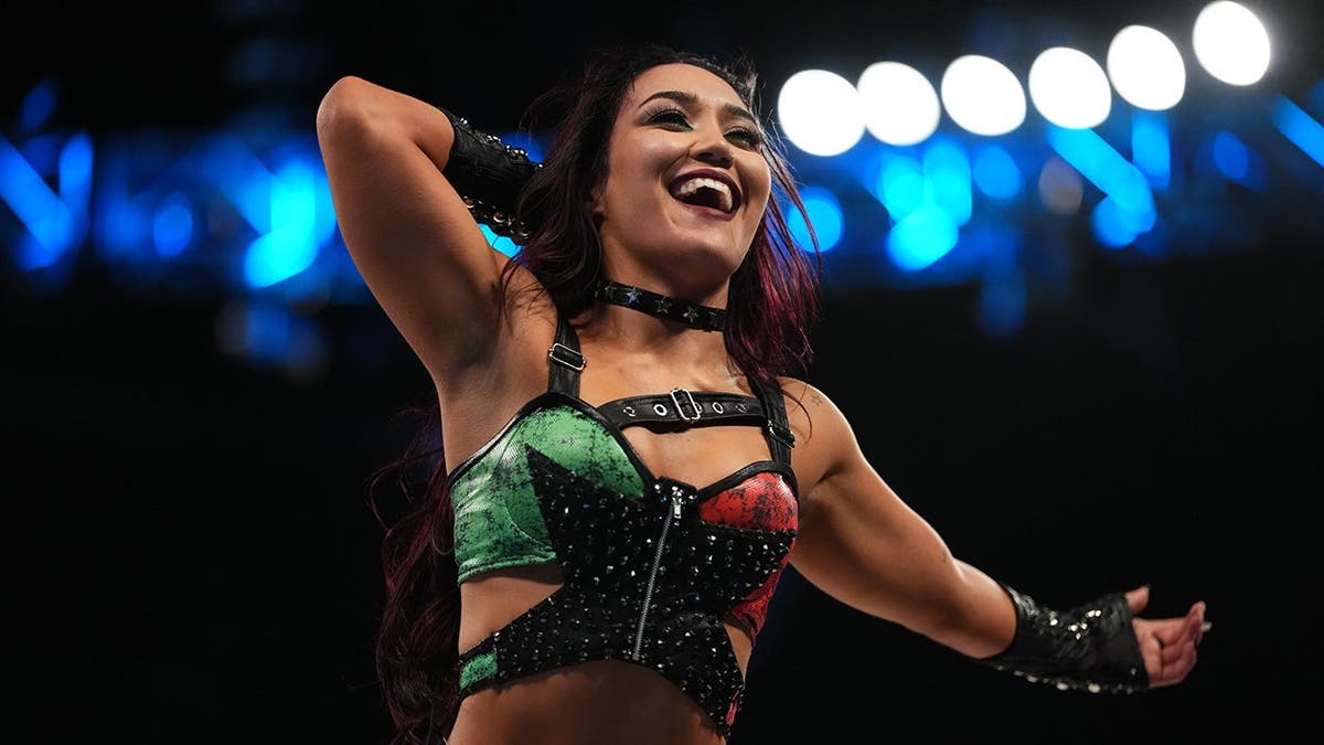 Roxanne Perez celebrates her win in the ring at MGM Grand Garden Arena.