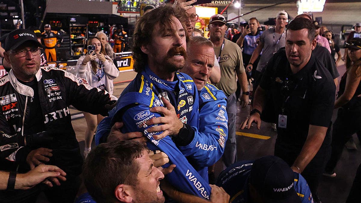 Ryan Blaney is separated from an altercation at Bristol Motor Speedway.