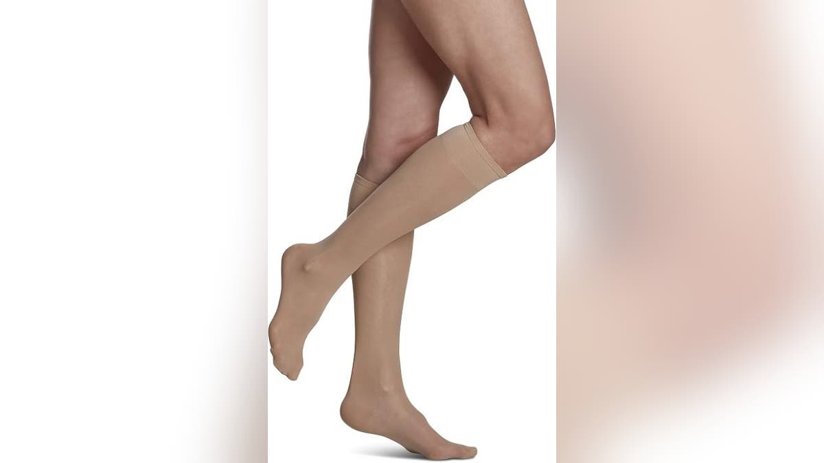 These sheer compression socks go with skirts and dresses or fit underneath pants.