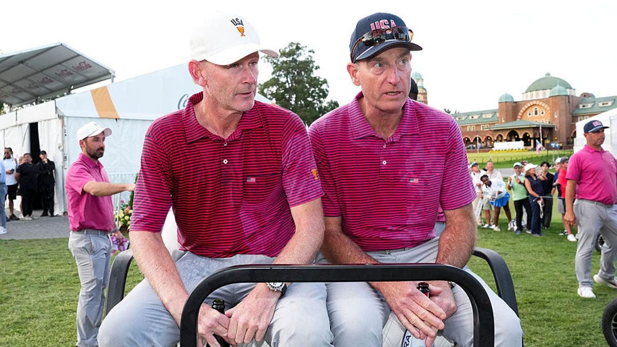 Captain Brandt Snedeker of the U.S. Team talks with Captain's Assistant Jim Furyk