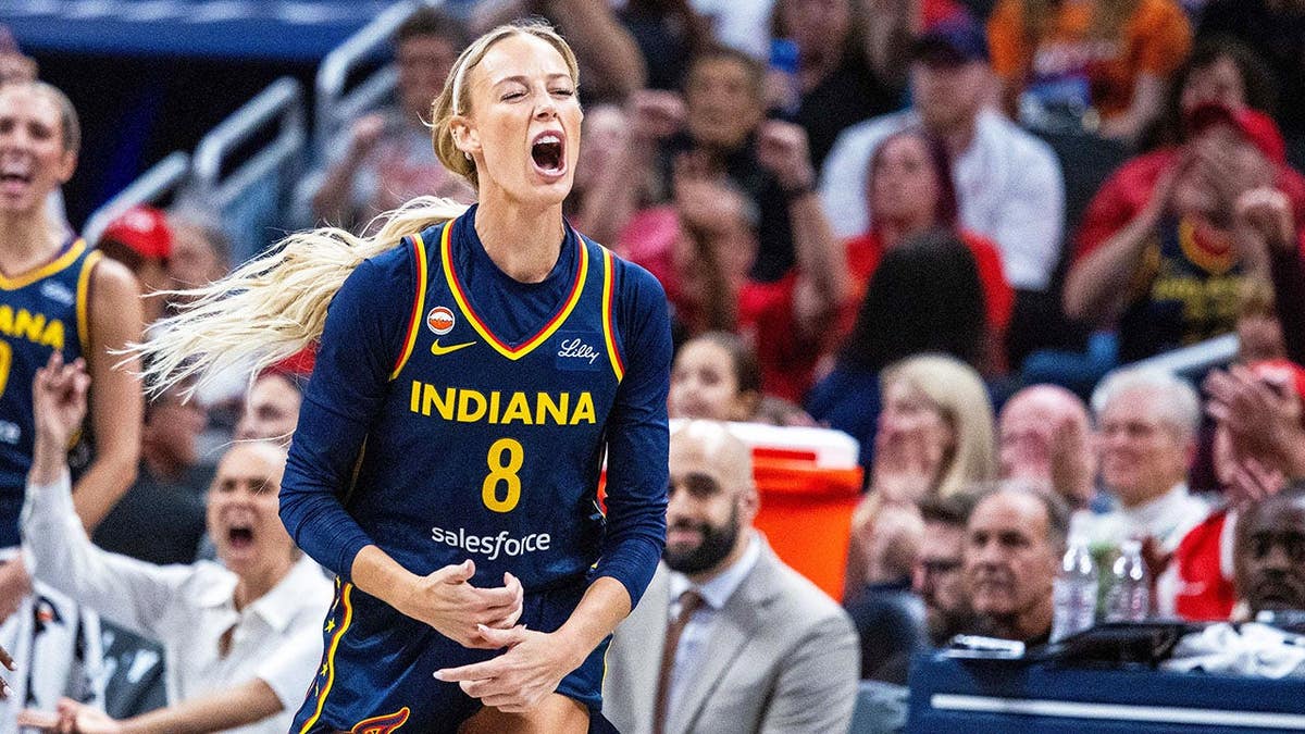 Sophie Cunningham celebrates a made shot during an Indiana Fever game against the Minnesota Lynx.