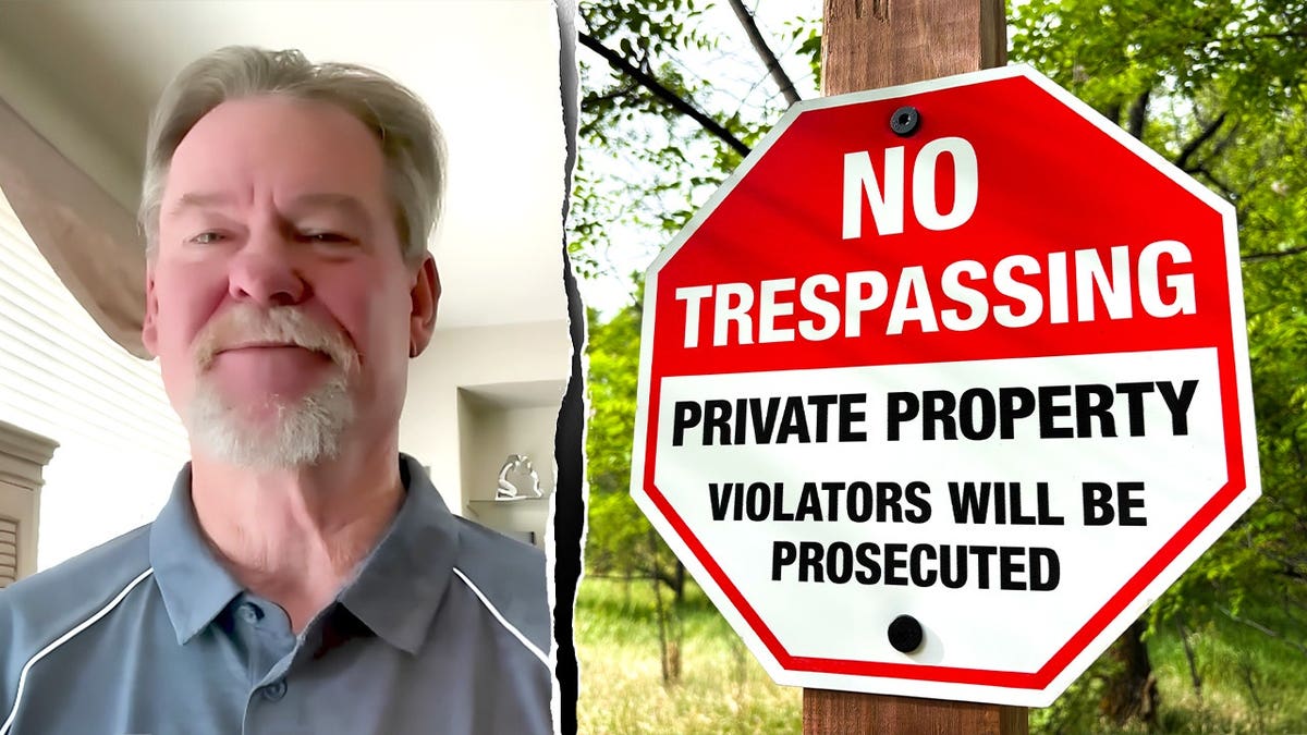 Flash Shelton pictured next to a no-trespassing sign.