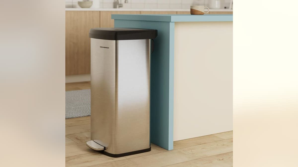 A foot pedal keeps this trash can hands-free.