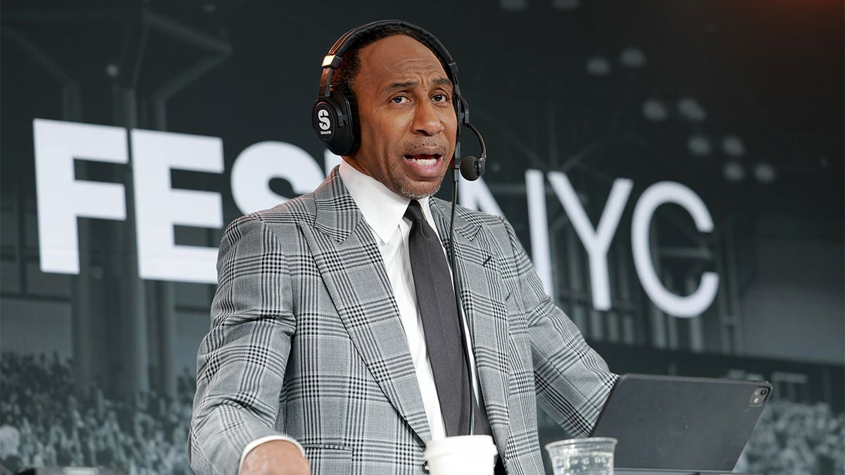 Stephen A. Smith speaks on stage at Fanatics Fest.