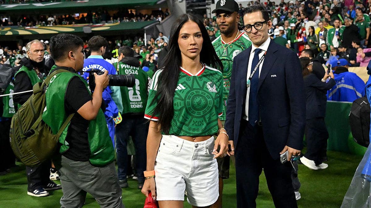Sydney Warner stands on the pitch at Mexico City Stadium.