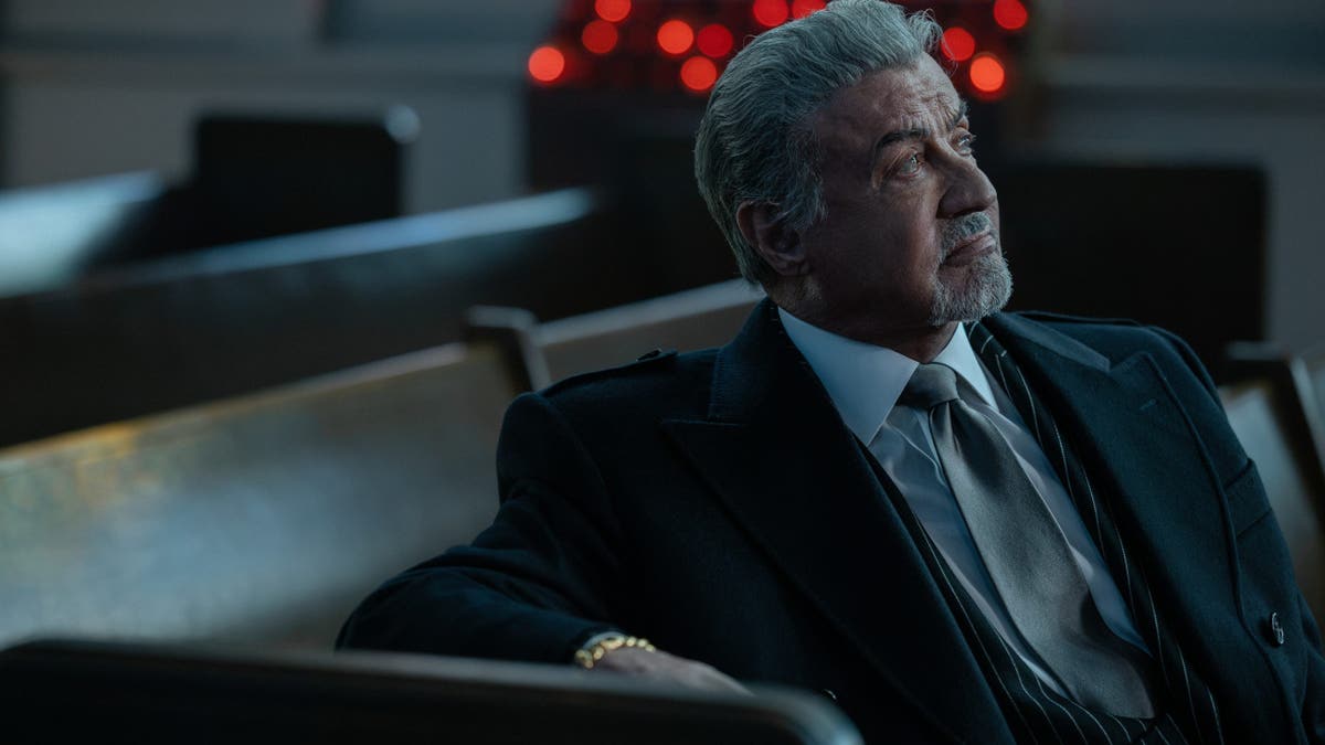 Sylvester Stallone sits as Dwight Manfredi in Tulsa King.