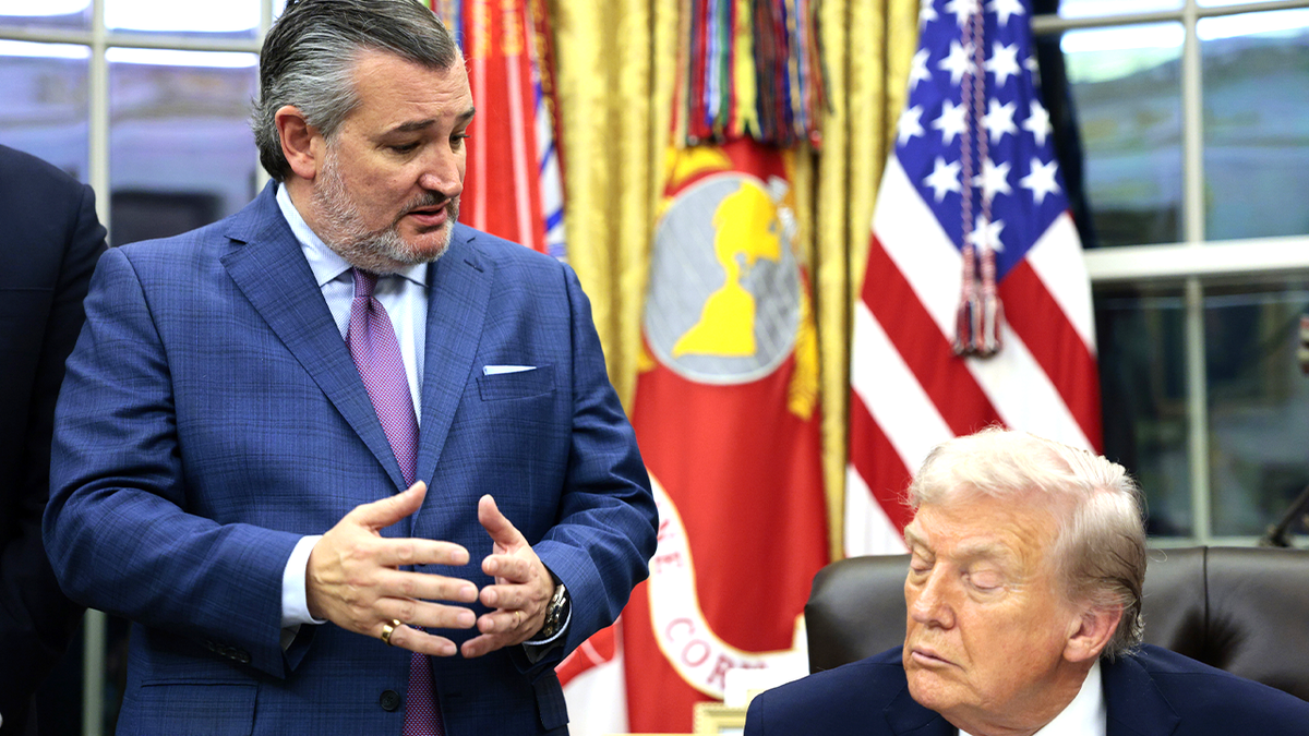 Sen. Ted Cruz stands with President Donald Trump in the Oval Office.