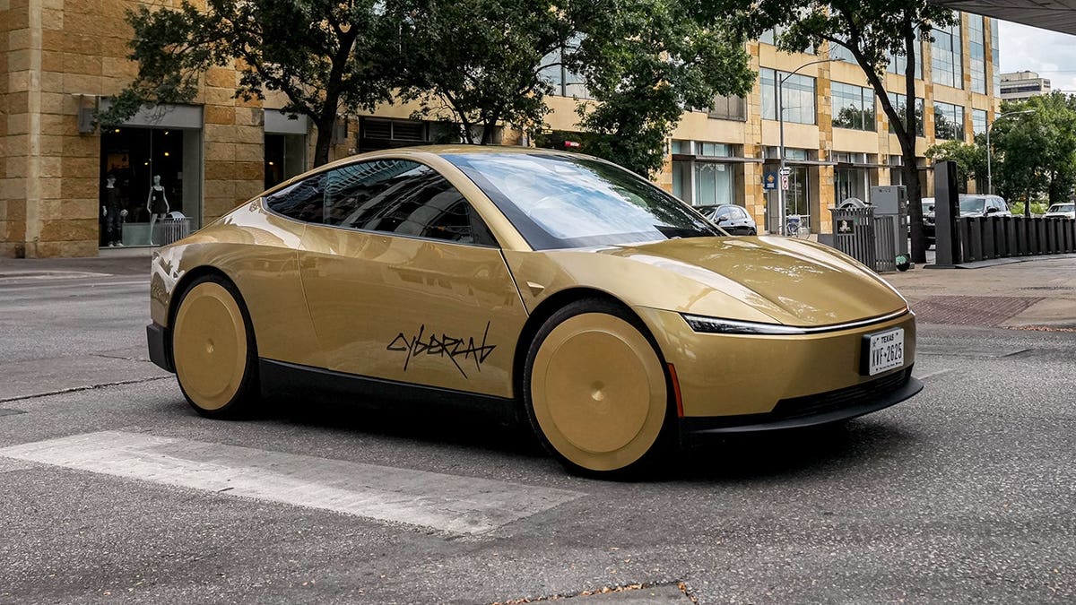 A Tesla Cybercab drives on the streets of Austin, Texas.