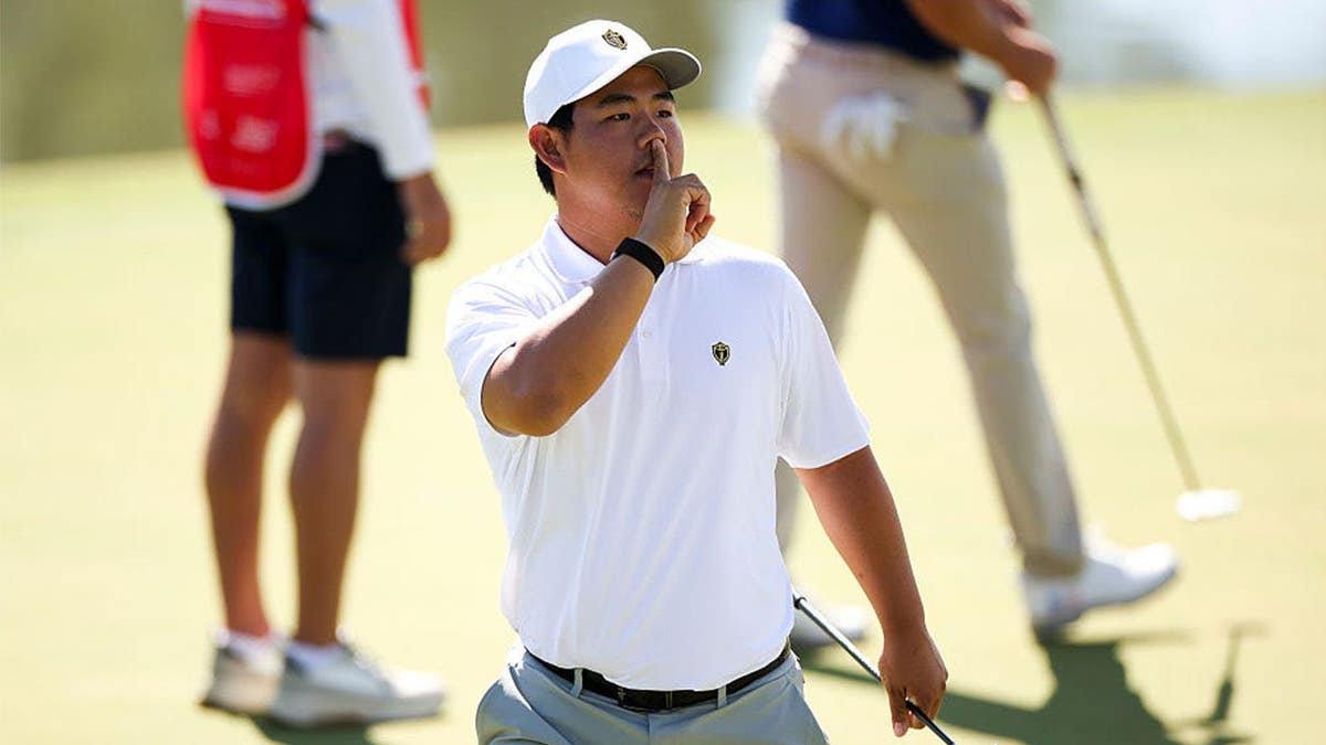 Tom Kim of the International Team