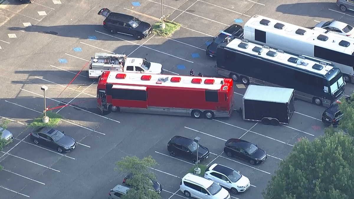 An overhead view of the tour bus that collapsed onto a worker