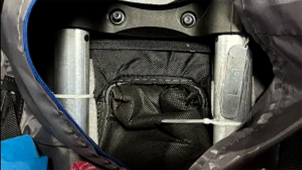 A travelers backpack with a concealed knife.