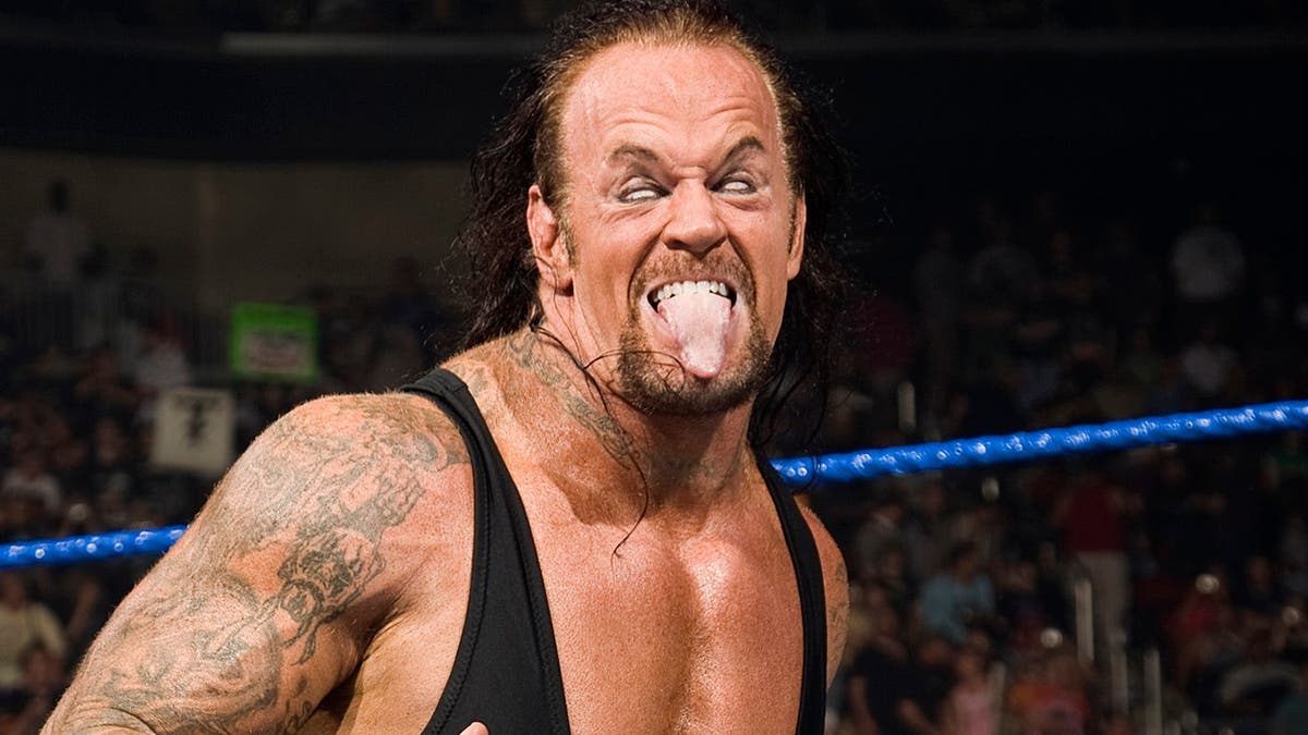 The Undertaker poses in the wrestling ring during SmackDown.