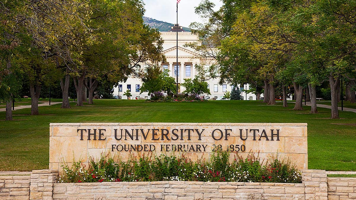 A sign marks the entrance to the University of Utah.