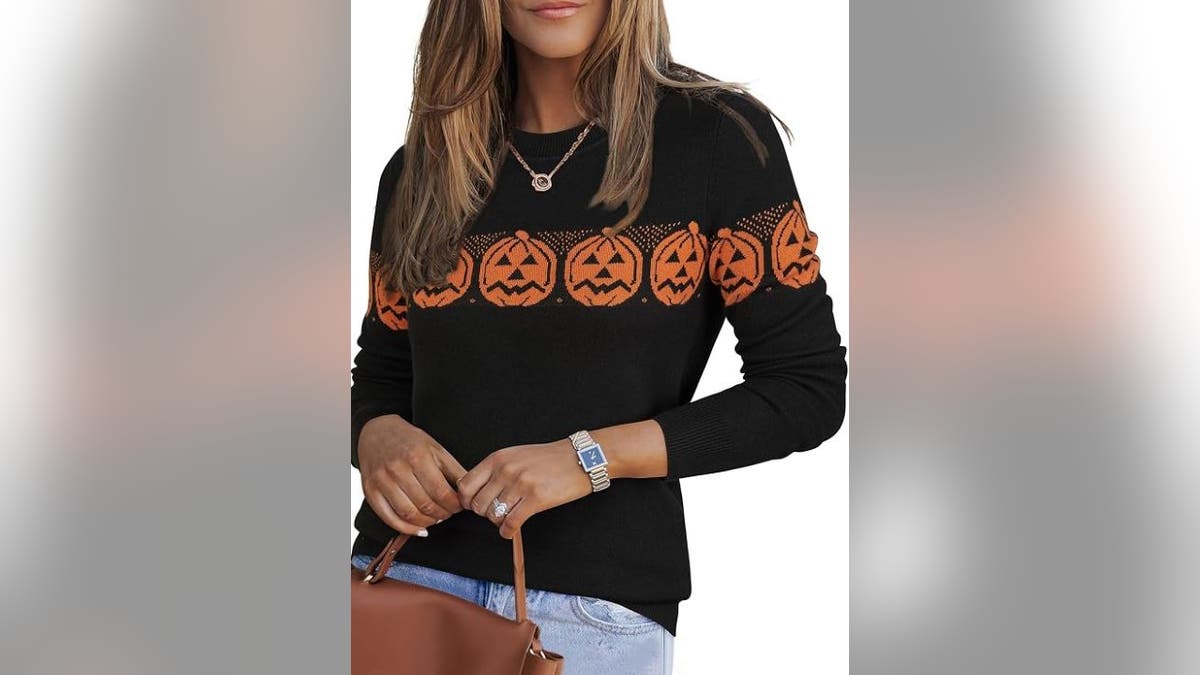 This sweater comes in sizes ranging from XS to XXL.