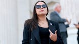 Rep. Alexandria Ocasio-Cortez wearing sunglasses