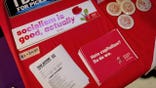 Democratic Socialists of America table with stickers and flyers