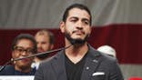 Dr. Abdul El-Sayed speaks at a podium during the Michigan Democratic Nominating Convention.
