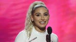 Abella Danger accepts an award onstage in Las Vegas.