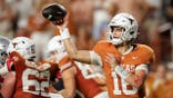 Arch Manning #16 passes the ball during a game against Ohio State at Darrell K Royal-Texas Memorial Stadium.