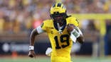 Bryce Underwood #19 of the Michigan Wolverines