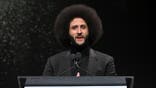 Colin Kaepernick speaks onstage during an awards dinner in New York City.