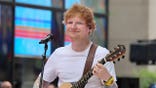 Ed Sheeran plays guitar