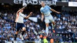 Erling Haaland heads the ball during Manchester City vs. Coventry City match at Etihad Stadium.