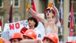 Fan gives thumbs down during ESPN's College GameDay at Penn State.