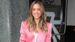 Jana Kramer stands in New York City.