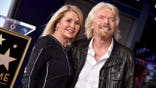 Sir Richard Branson and Joan Templeman attend a Hollywood Walk of Fame ceremony.