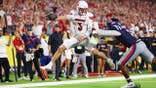 Lincoln Kienholz rushes for a touchdown against Ole Miss at Nissan Stadium.